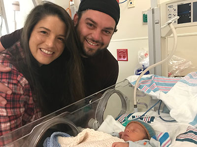 Parents with baby in NICU